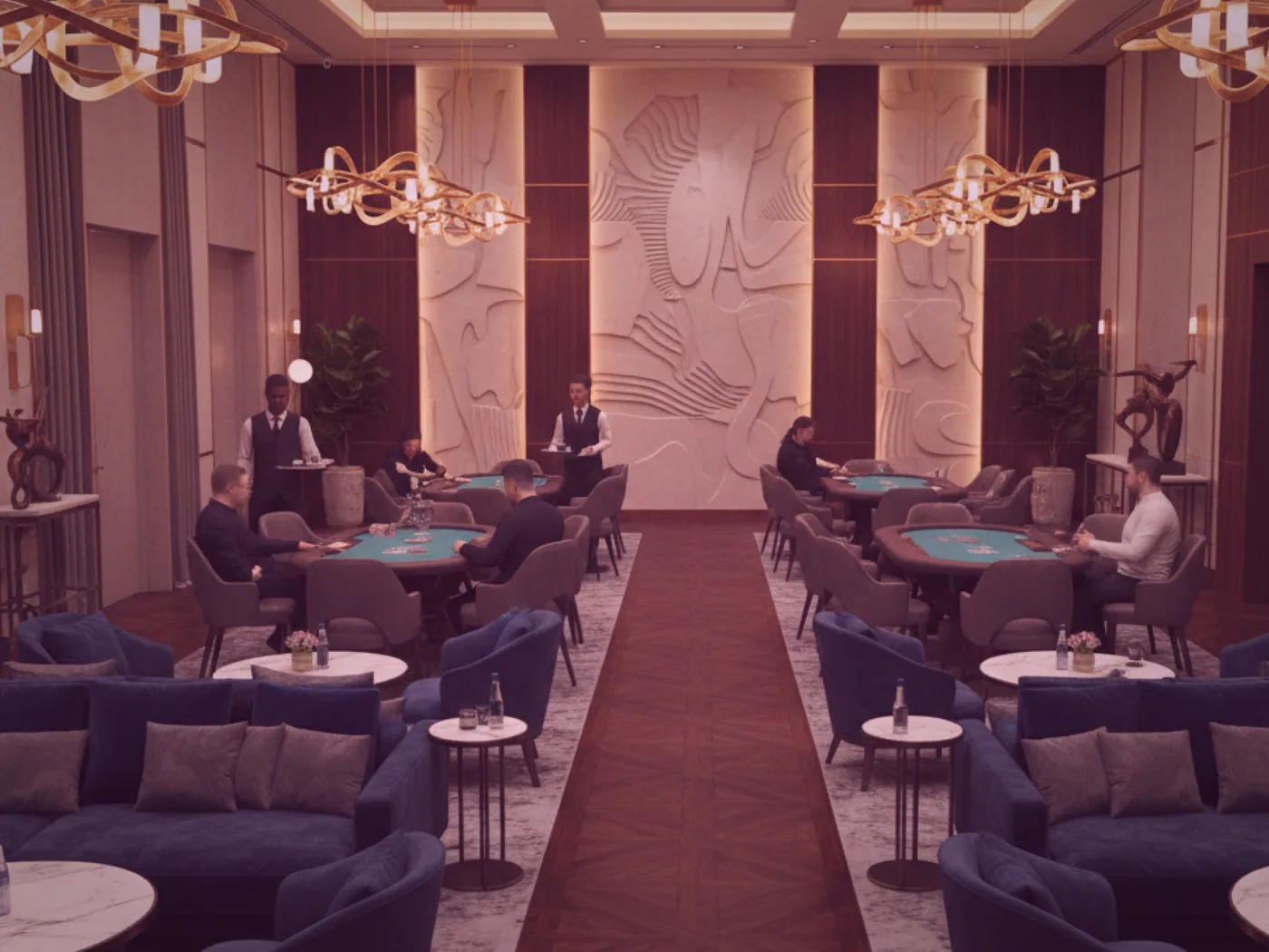 A wider view of the card parlour, tables spaced beneath the original grain-office trusses.